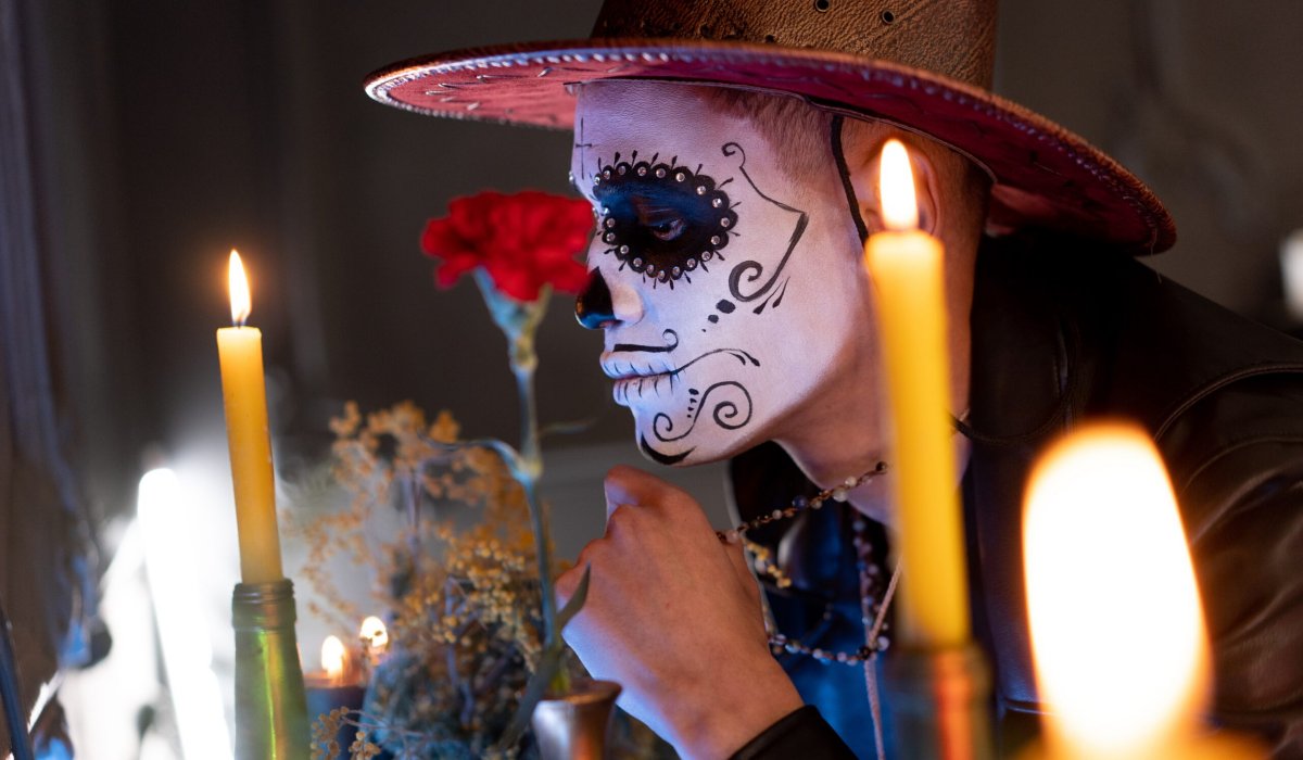 Celebrations of the dead - Person in full face paint for Dia de los Muertos